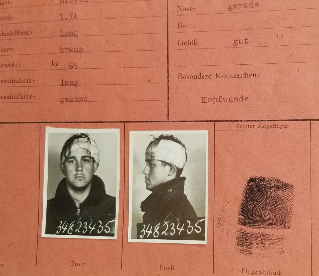 Bob Bright Card from WWII German POW camp with photo of young American soldier with bandage on his head.